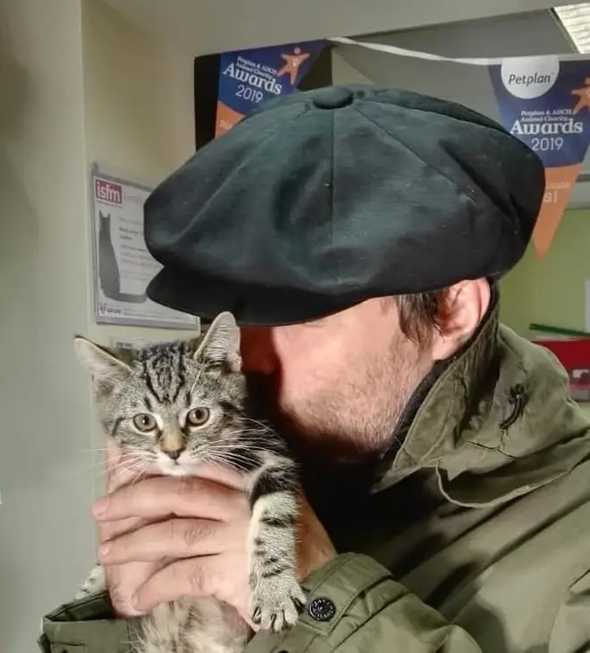 Liam Gallagher holds his new kitten Sid, which he adopted from Wood Green, The Animals Charity