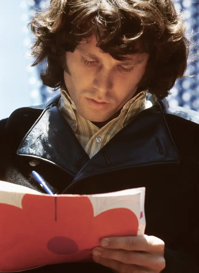 The Lizard King himself, Jim Morrison, signs a copy of the Fantasy Fair And Magic Mountain Music Festival programme.