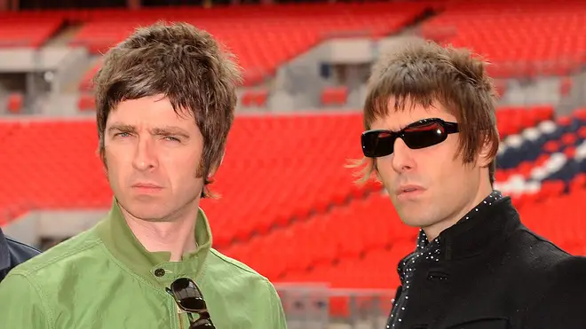 Noel and Liam Gallagher pose at Wembley Stadium on October 16, 2008