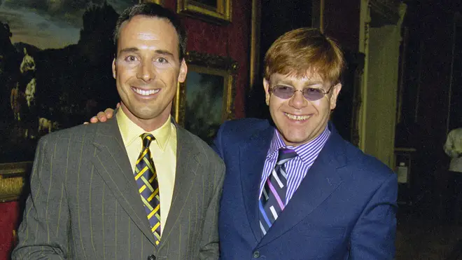 David Furnish and Elton John in June 1997