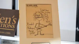 The signed self portrait drawing by Nirvana's Kurt Cobain went for $281,250