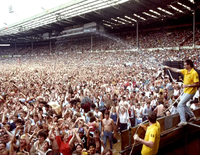Live Aid Wembley Stadium - hosing down the crowds