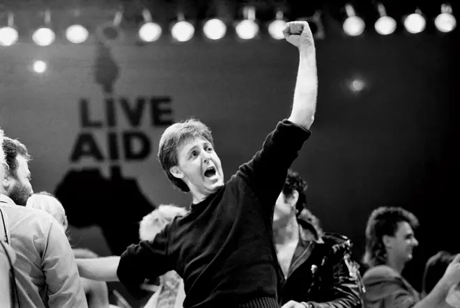 Paul McCartney salutes the Live Aid audience
