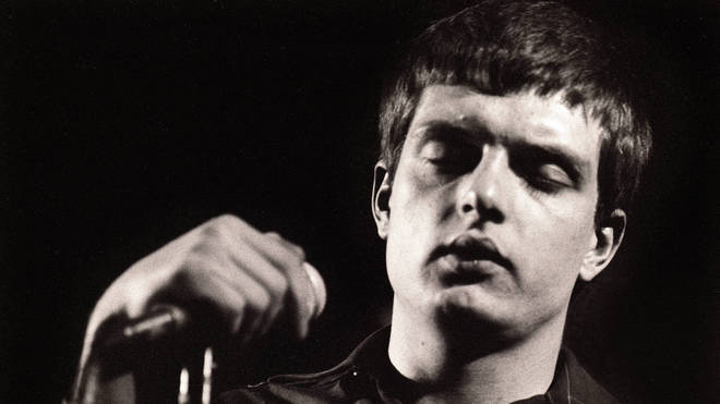 Ian Curtis performing live with Joy Division in January 1980