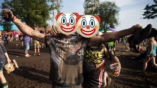 Two festival-goers who will regret that mudbath later on