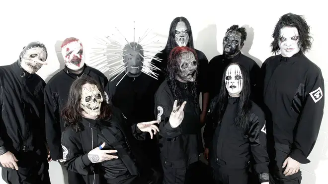 Photo of SLIPKNOT and Chris FEHN and Shawn CRAHAN and Sid WILSON and Craig JONES and Corey TAYLOR and Mick THOMSON and Joey JORDISON and Paul GRAY and James ROOT