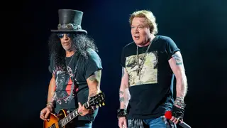 Axl Rose and Slash performing with Guns N'Roses in Texas in October 2019