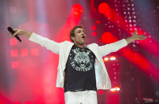 Duran Duran frontman Simon Le Bon lapped up the energy from the massive Main Stage crowd. (Photo by Mark Holloway/Redferns)