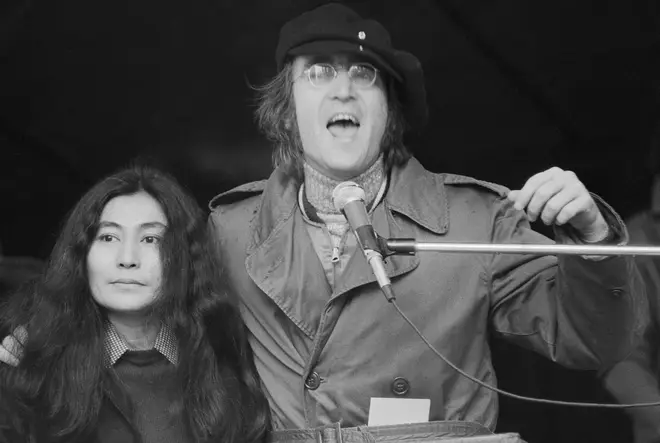 John Lennon and Yoko Ono address an antiwar rally in Manhattan's Bryant Park, 22 April 1972.