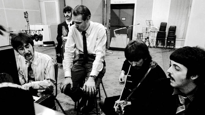 The Beatles in the studio in 1967, recording Sgt Pepper with producer George Martin