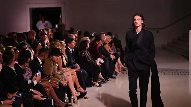 Lennon Gallagher walks the runway during the Fashion For Relief catwalk show London 2019