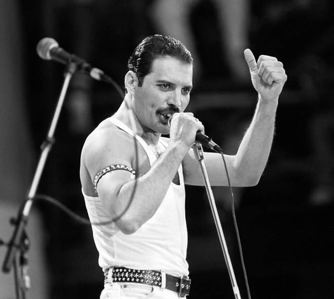 Freddie Mercury during Queen's show-stopping set at Live Aid, Wembley Stadium 13 July 1985
