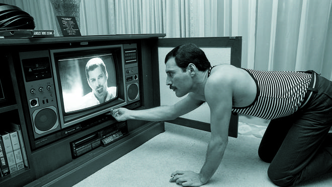 Freddie Mercury watches himself on TV in Japan, May 1985