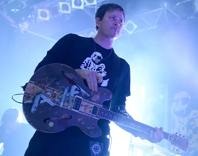 Tom DeLonge onstage with Angels & Airwaves in 2012