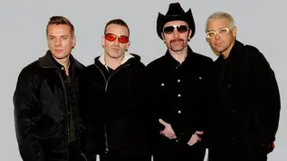 U2 at the MTV Awards in 1997: Larry Mullen Jr., Bono, The Edge and Adam Clayton