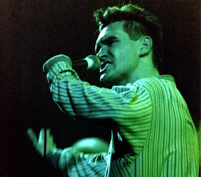 Morrissey of The Smiths performs on stage at Brixton Academy in 1986