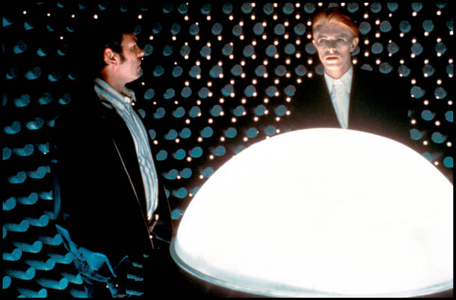 Rip Torn and David Bowie in The Man Who Fell To Earth (1976). A photo from this scene appeared on the cover of Bowie's Station To Station album the same year.