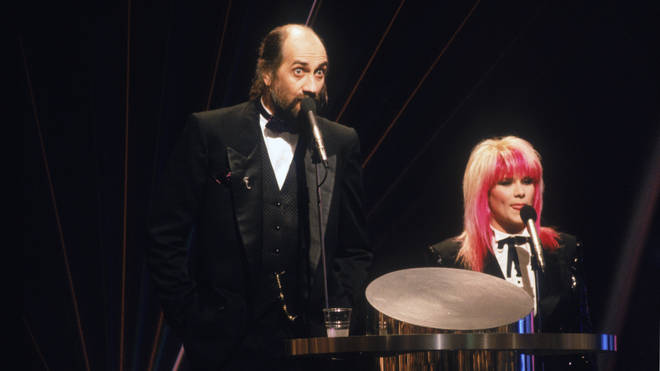Mick Fleetwood and Samantha Fox at the BRIT Awards ceremony at the Royal Albert Hall, London, 18th February 1989.