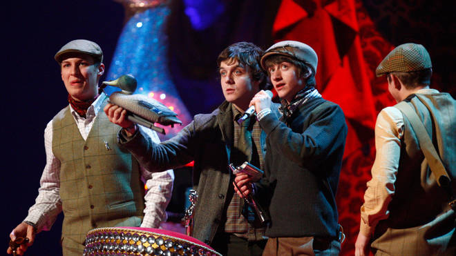 Arctic Monkeys celebrate after winning the Best British Group award at the BRITs in 2008