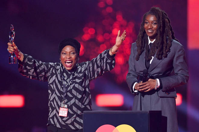 Little Simz accepts the Best New Artist award alongside her mother during The BRIT Awards 2022