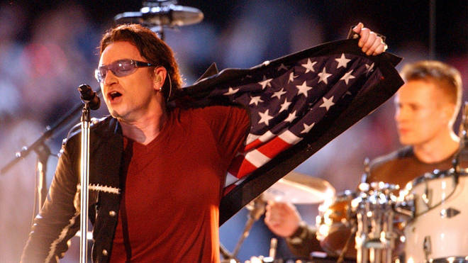 U2 lead singer Bono performs during the Super Bowl XXXVI halftime show at the Louisiana Superdome in 2002