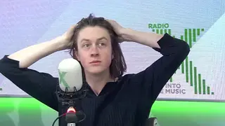 Blossoms frontman Tom Odgen reveals his hairline in the Radio X studio