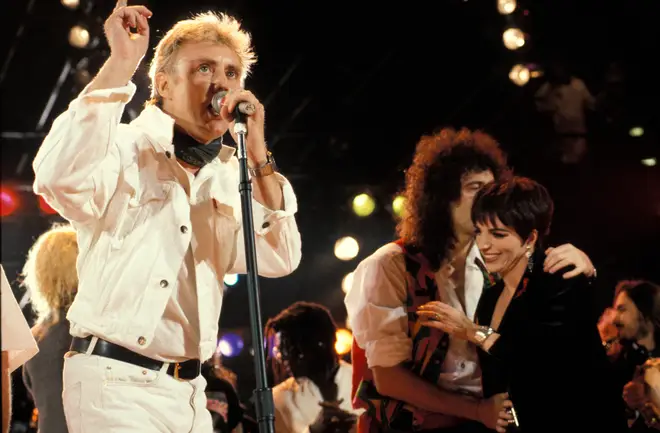 Roger Taylor, Brian May and Liza Minelli performing on stage at the Freddie Mercury Tribute concert