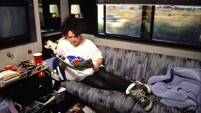 Robert Smith on The Cure's tour bus in the US in the summer of 1992. Note the Friday I'm In Love t-shirt!