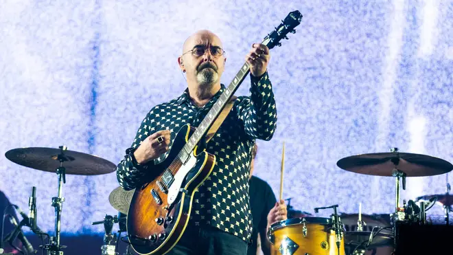 Bonehead performs with Liam Gallagher at The O2 Arena in 2019