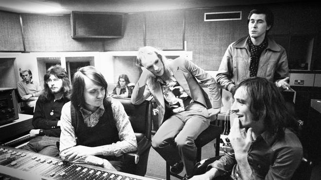 Brian Eno struggles to get near to the mixing desk at a 1972 Roxy Music session