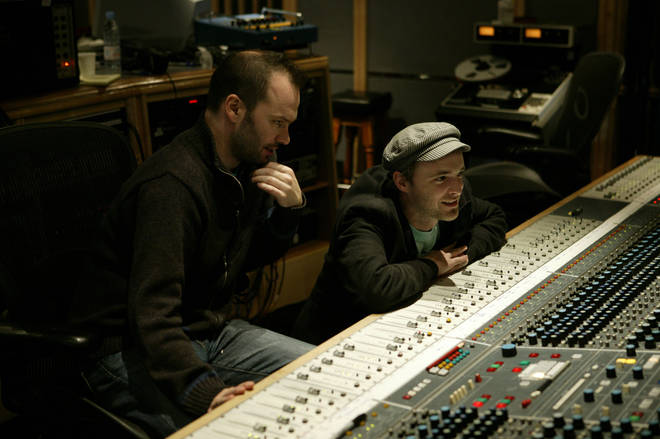 Fran Healy of Travis asks Nigel Godrich for more "top" on his vocals as they record Band Aid 20 in 2004