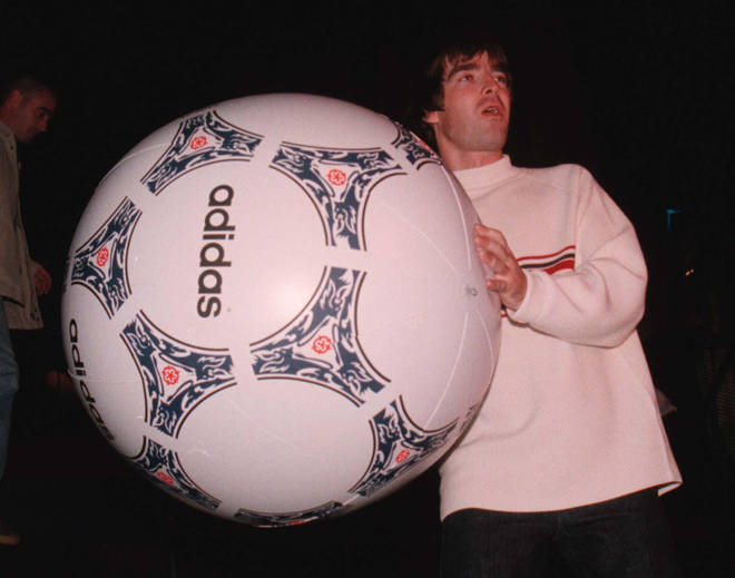 Noel Gallagher takes to the stage at the 1996 Oasis shows at Knebworth
