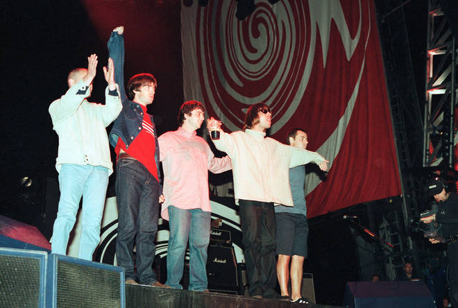 Oasis take a bow after the second of two nights at Knebworth. August 1996