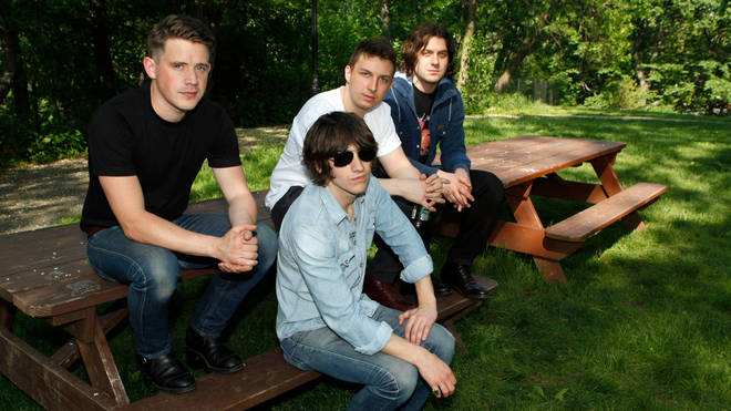 Nick O'Malley, Alex Turner, Matt Helders and Jamie Cook pose for a portrait in New York's Central Park May 24, 2011.