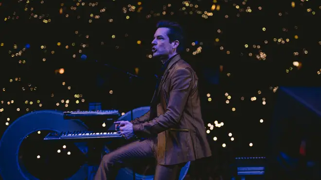 The Killers' Brandon Flowers donned a gopld suit for the second night at Emirates stadium