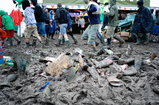 A welly graveyard at Glastonbury in 2011