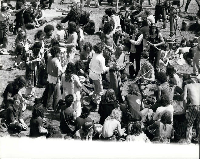 A group of hippies dancing during summer solstice celebrations at the second Glastonbury Festival.