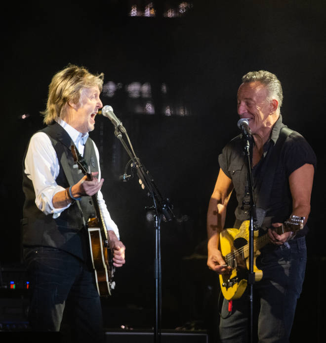 Paul McCartney performs with Bruce Springsteen as he headlines the Pyramid Stage