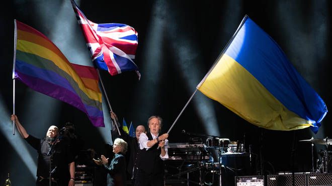 Sir Paul McCartney waves the Ukrainian flag at the end of his Glastonbury 2022 set