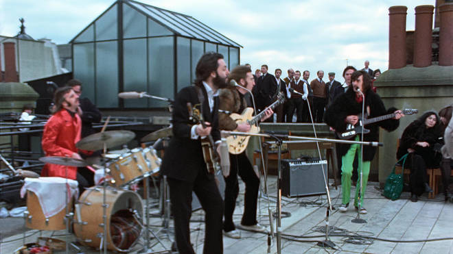 The Beatles play the Apple offices rooftop in January 1969