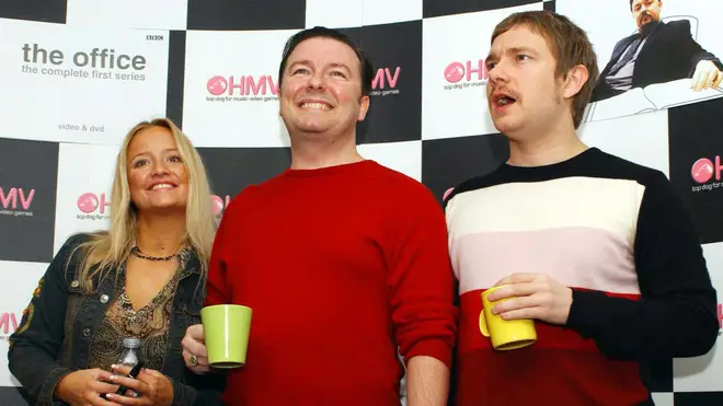 Lucy Davis, Martin Freeman and Ricky Gervais sign copies of The Office DVD in October 2002.