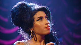 Amy Winehouse performing on stage in 2007