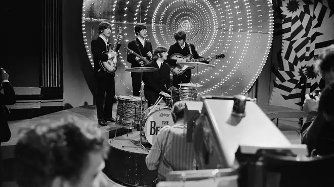 The Beatles performing live on Top Of The Pops in June 1966