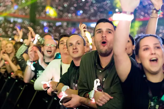 Which artist are these fans watching?