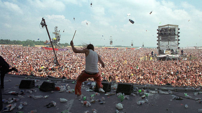 Kid Rock asked the Woodstock '99 crowd to throw bottles. They obliged.