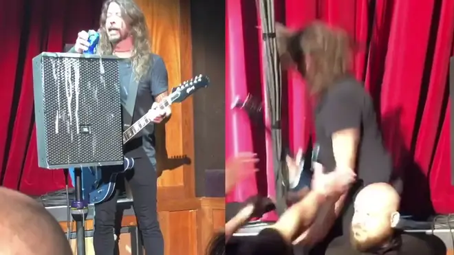 Dave Grohl falls offstage after downing beer
