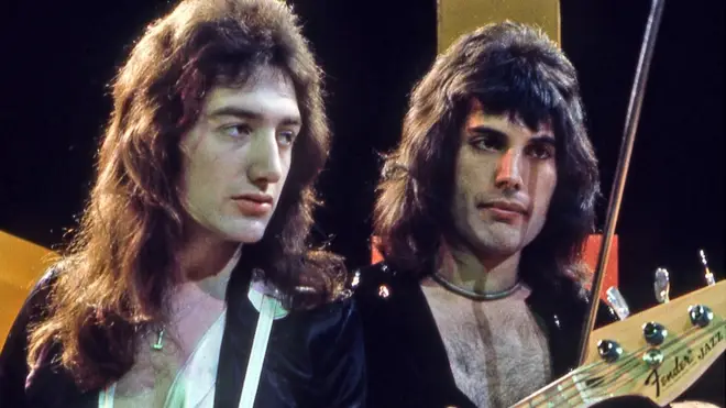 John Deacon and Freddie Mercury performing with Queen in the mid-70s