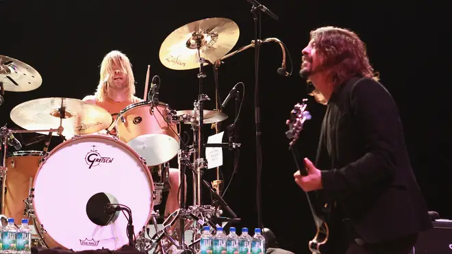 Taylor Hawkins and Dave Grohl of Foo Fighters perform at Hammerstein Ballroom on February 13, 2013