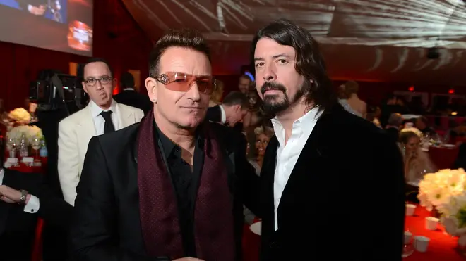 Bono of U2 and Dave Grohl attend the 21st Annual Elton John AIDS Foundation Academy Awards Viewing Party at West Hollywood Park on February 24, 2013