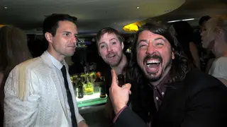 Brandon Flowers, Ricky Wilson and Dave Grohl in 2008